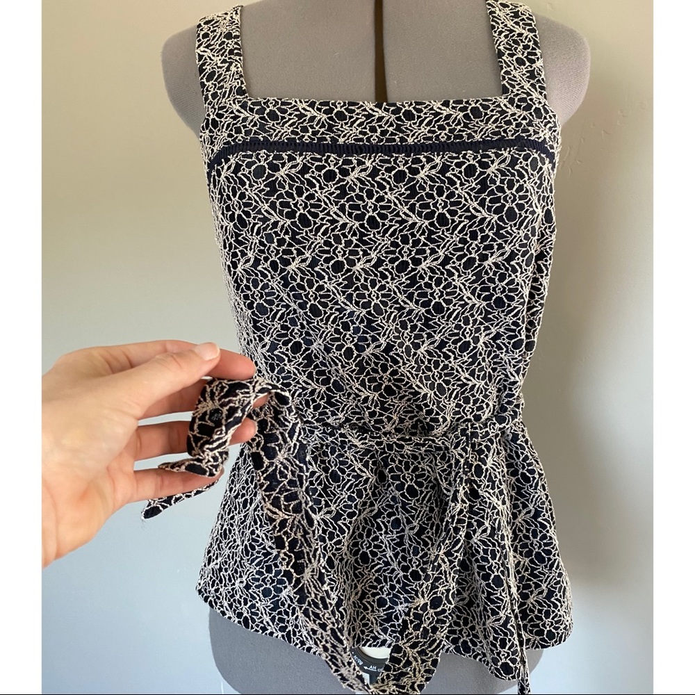 Beautifully detailed peplum top